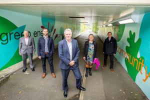 James Sunderland unveils a mural in an underpass under Berkshire Way